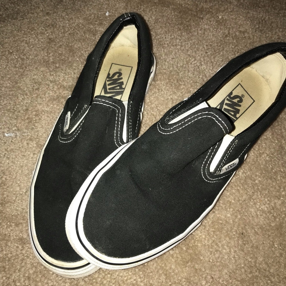 Black and white slip on vans